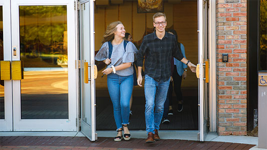 Transfer students leaving chapel at Calvin University